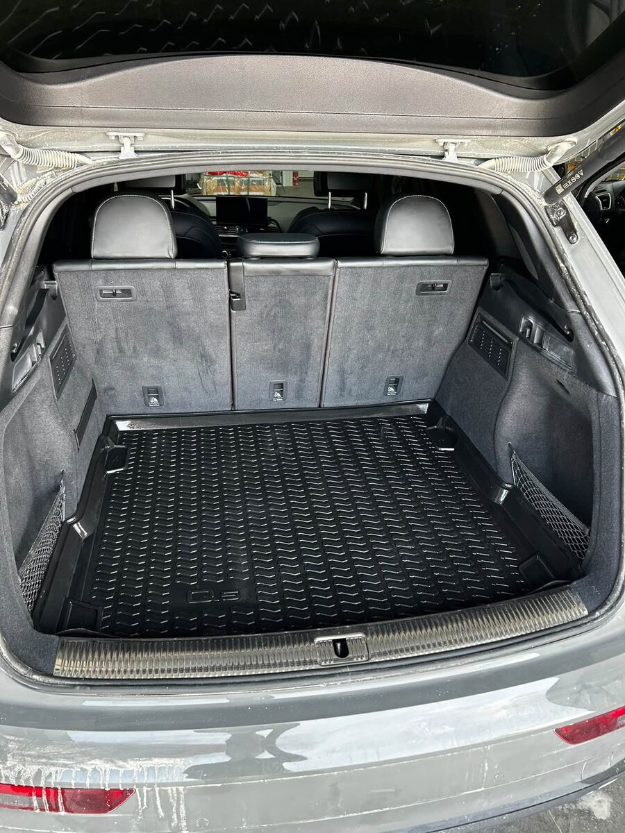 Audi SQ5 cargo area after, clean black mat and sill